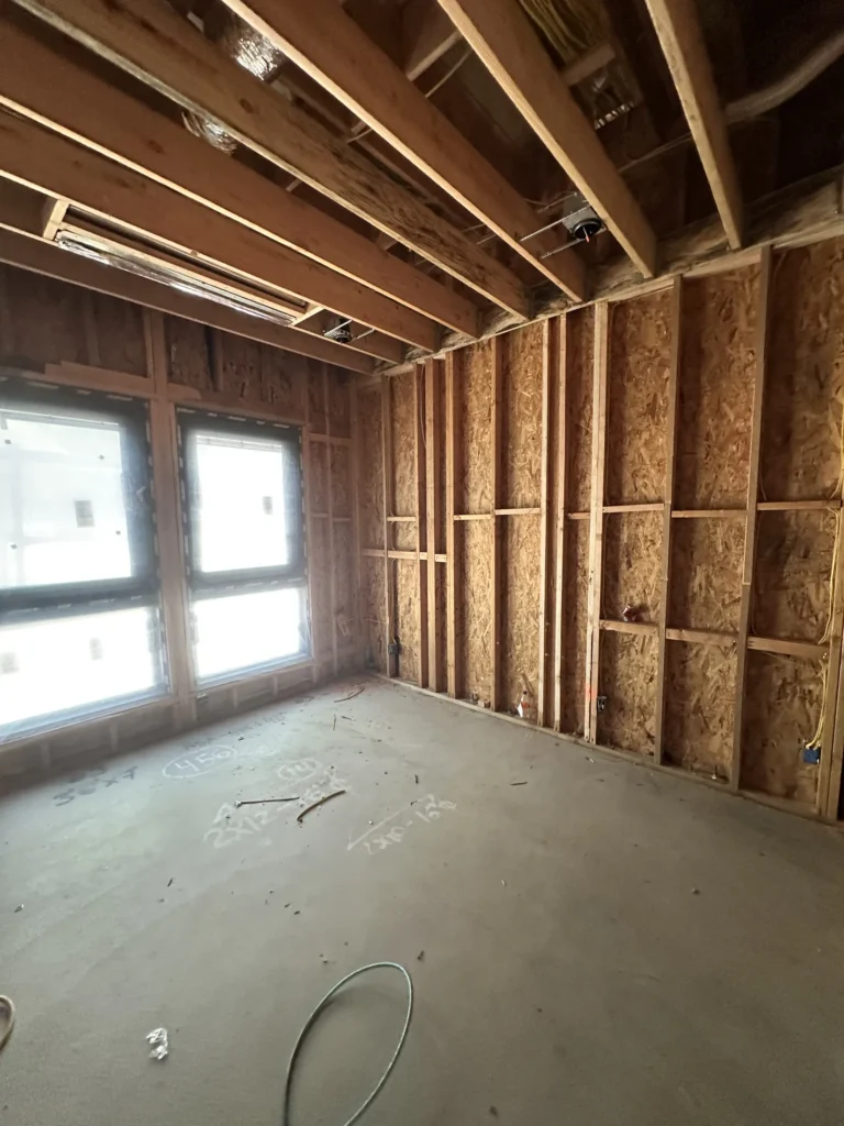 Framed interior room during Southern California custom home construction