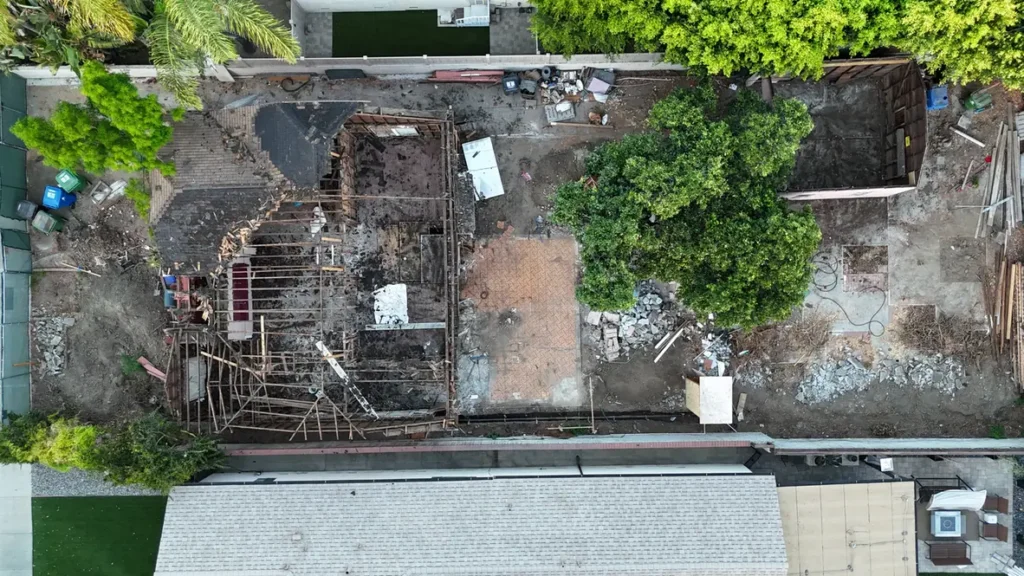 Top-down view of roof removal during whole-home renovation.