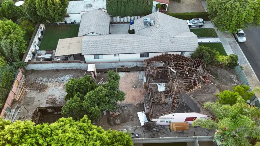 Side and rear aerial view of the demolition work area.