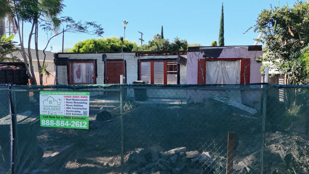 Closer front view of exposed structure during demolition.