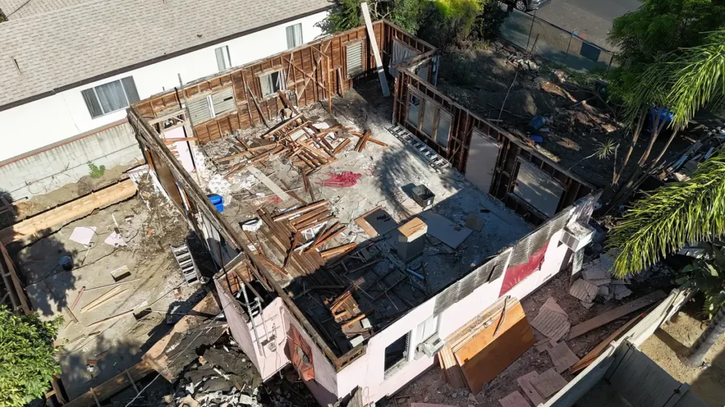 High-angle view into the exposed interior during demolition.