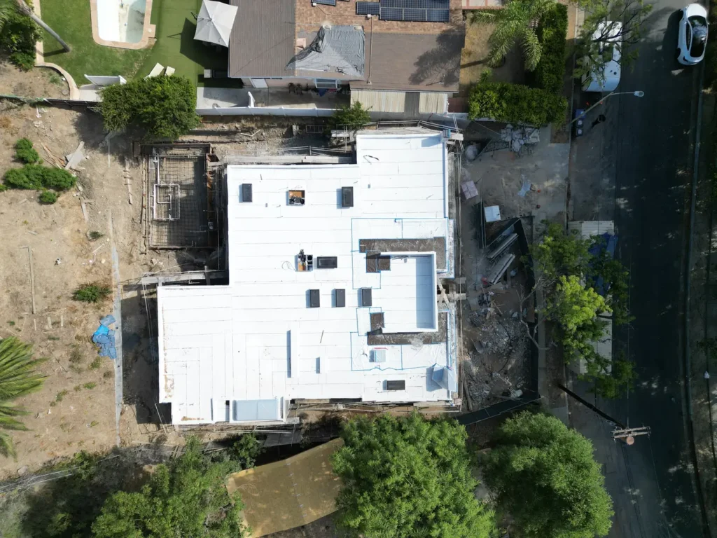 Later overhead view of the roof covering and roof openings.