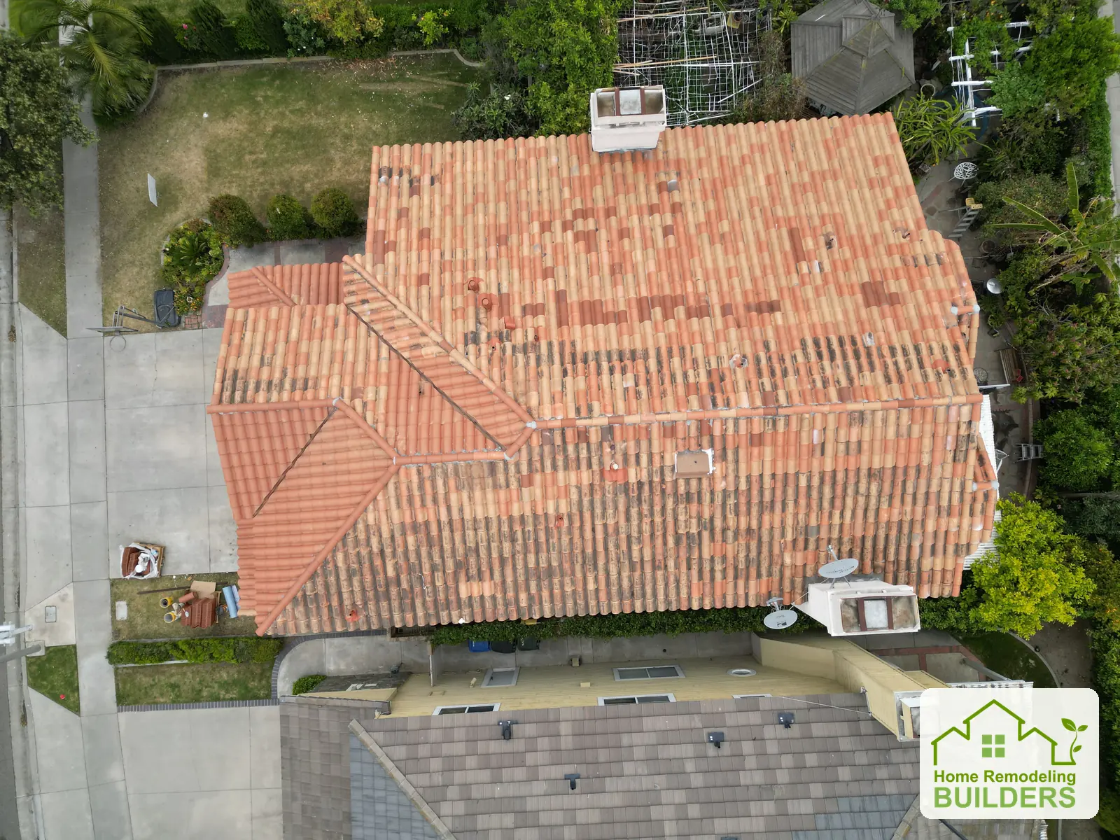 The reset tile roof in a straight-down aerial view. Cerritos roofing project.