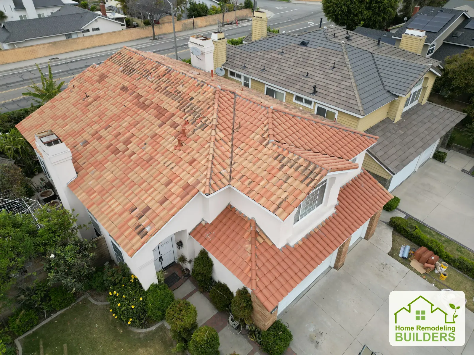 The finished tile roof above the front elevation. Cerritos roofing project.