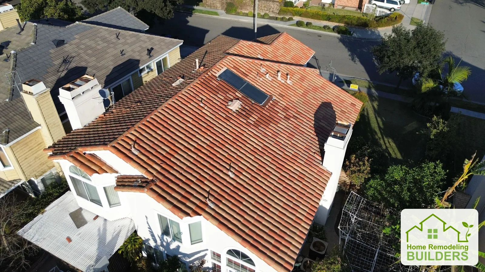 The original tile roof viewed from the opposite side. Cerritos roofing project.