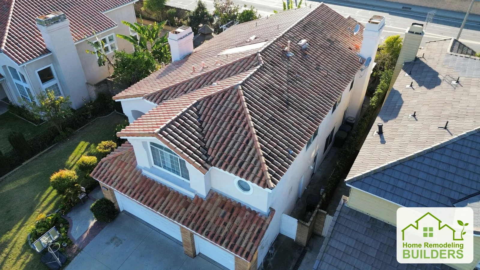 The original tile roof above the front of the Cerritos home. Cerritos roofing project.