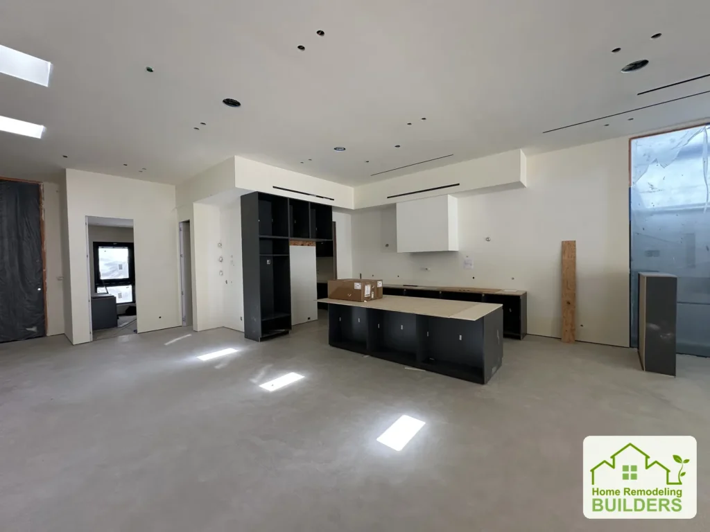 September kitchen progress with cabinets and the island in place.