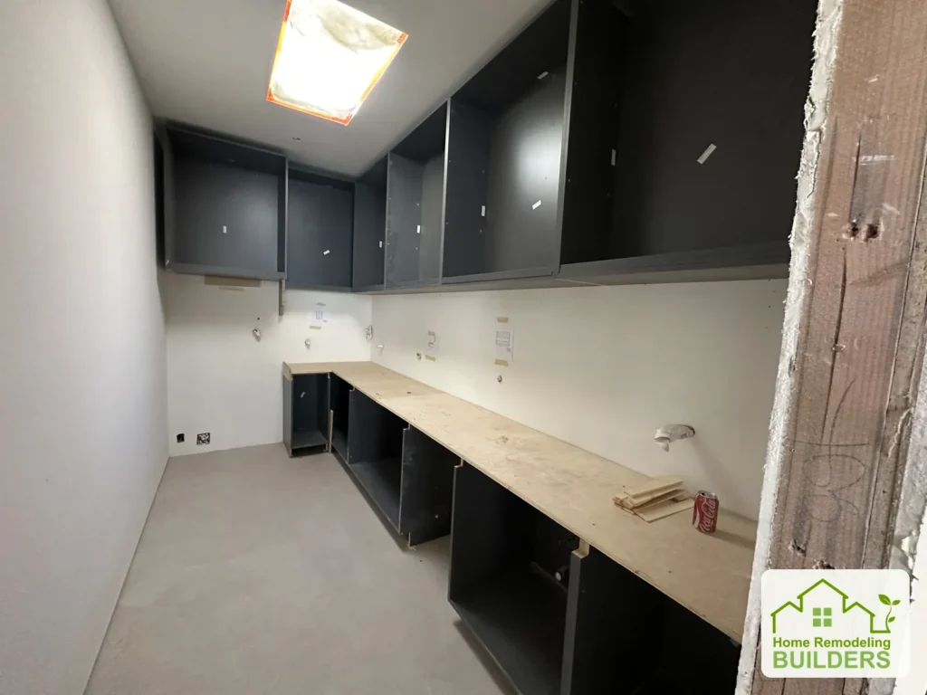 Pantry cabinetry and work surface during interior finishing.