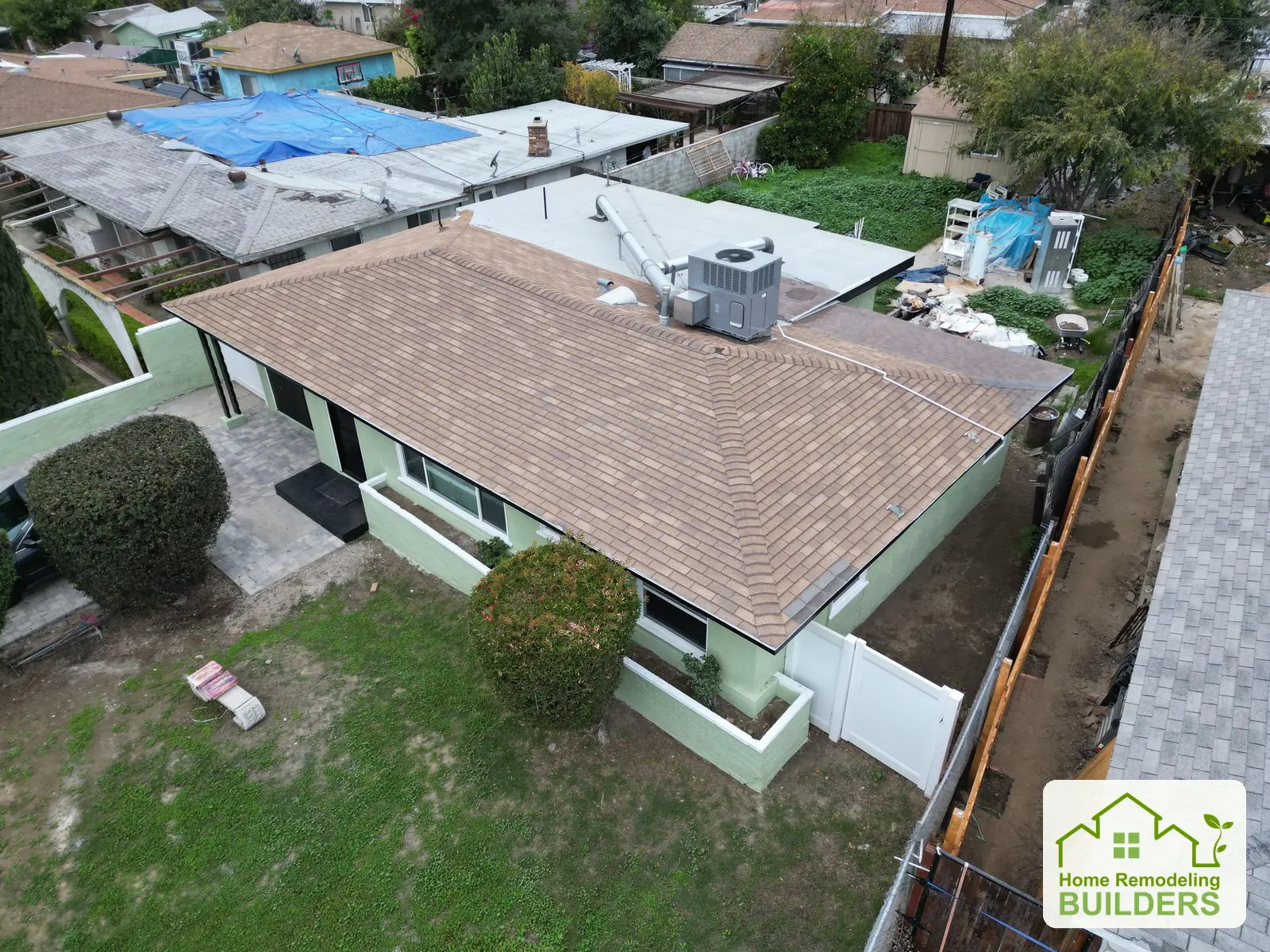 The original shingle roof viewed from above. Duarte roofing project.