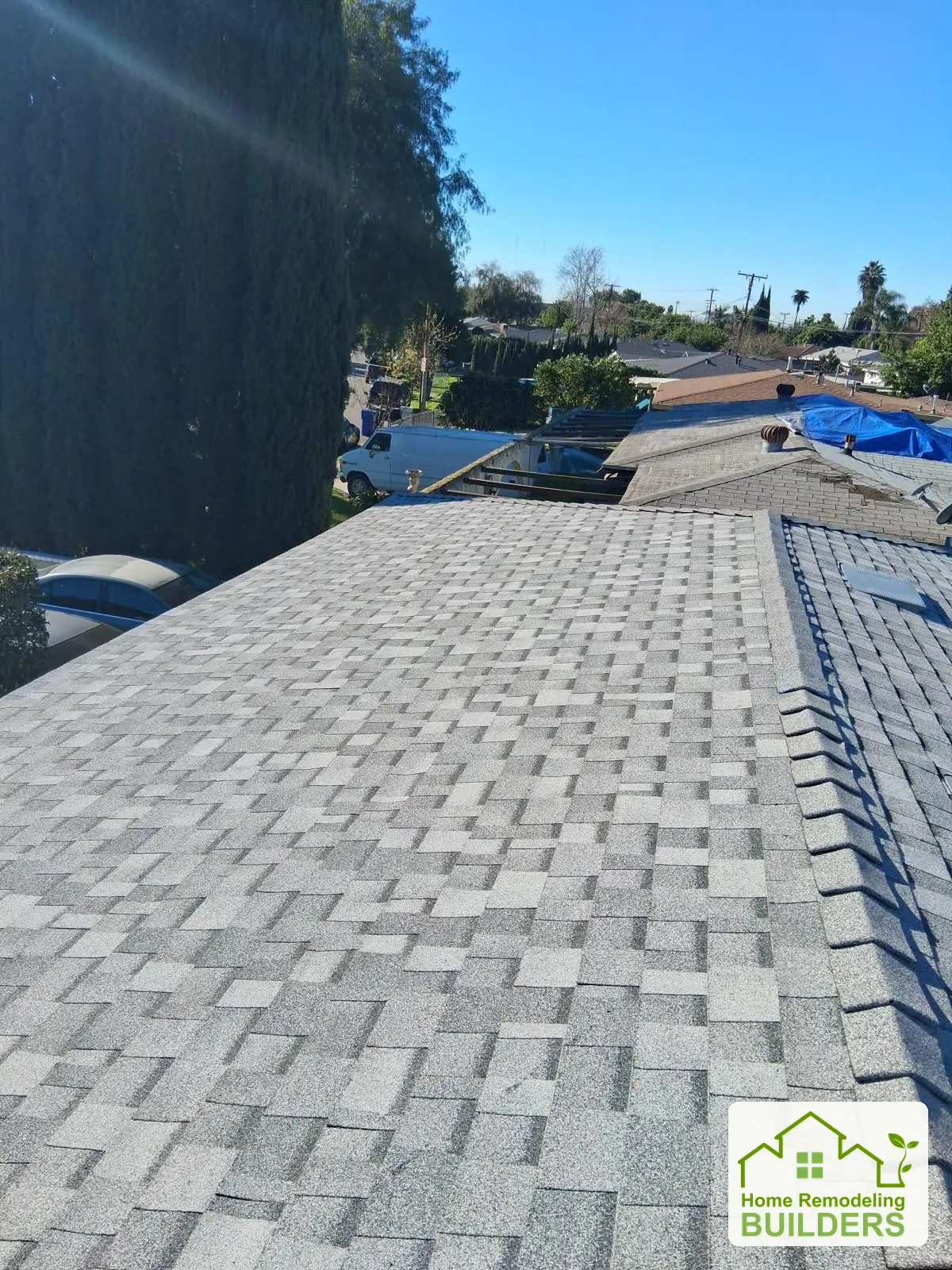 Shingle courses and roof details on the opposite slope. Duarte roofing project.