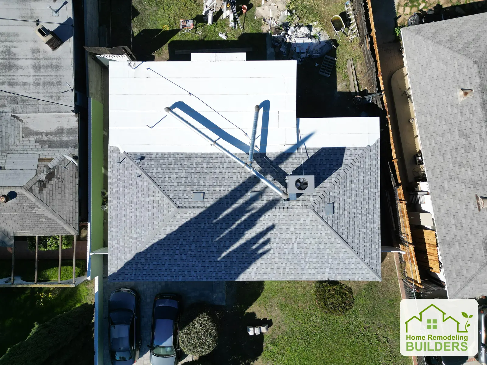 An overhead view of the combined shingle and flat roof. Duarte roofing project.