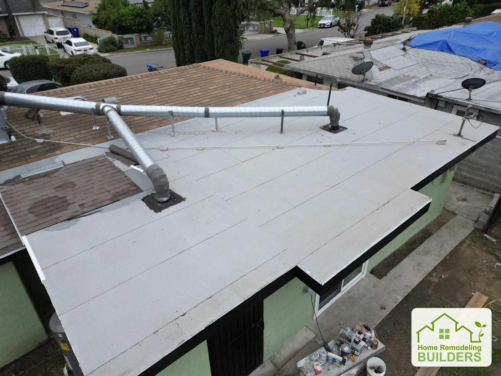 A closer view of the original roof surface around duct supports. Duarte roofing project.