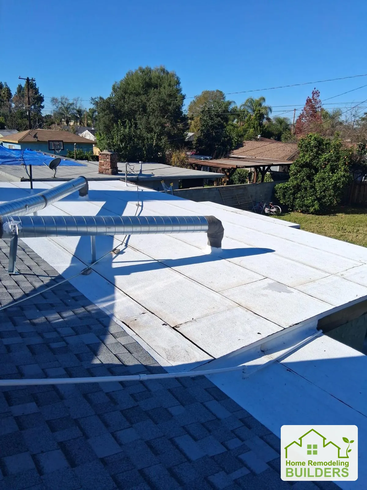 The completed adjoining flat-roof area. Duarte roofing project.