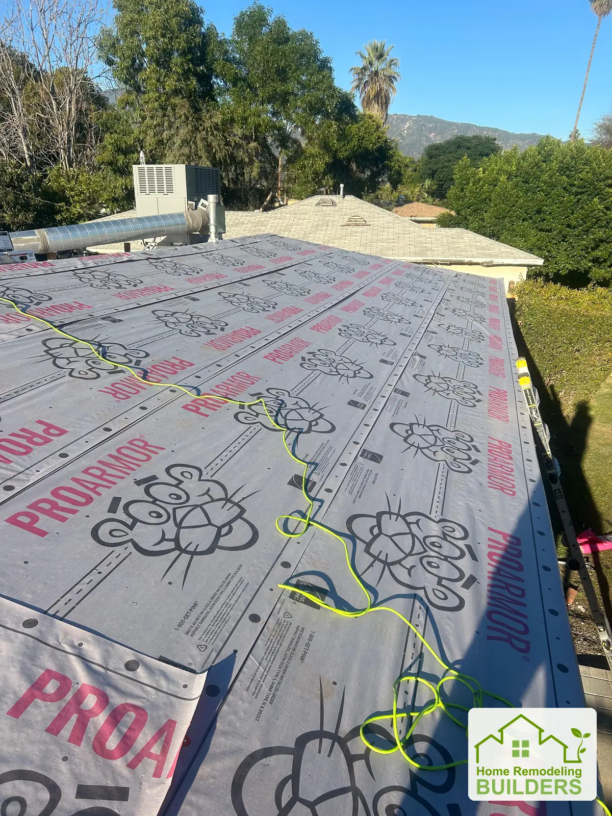 Underlayment across the opposite roof slope. Duarte roofing project.