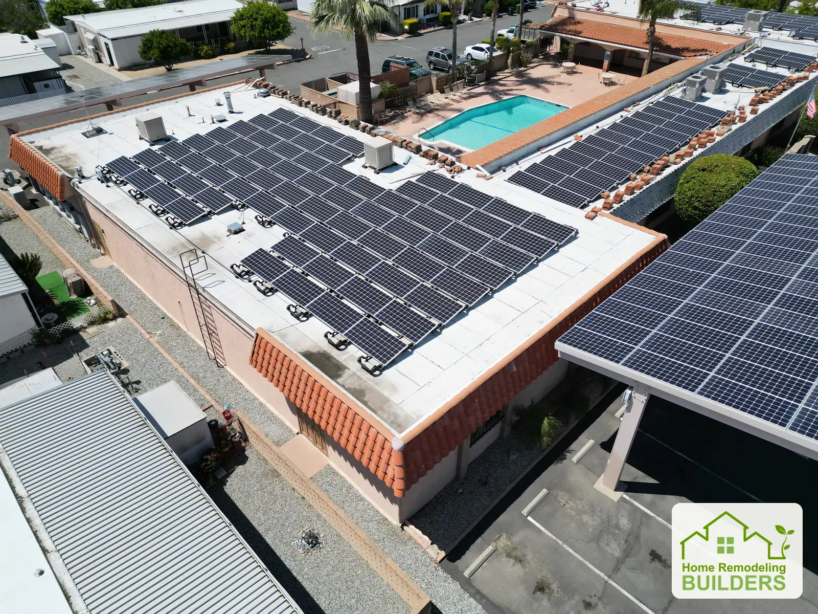 Roof edges and existing solar arrays from the opposite aerial angle. Hemet roofing project.