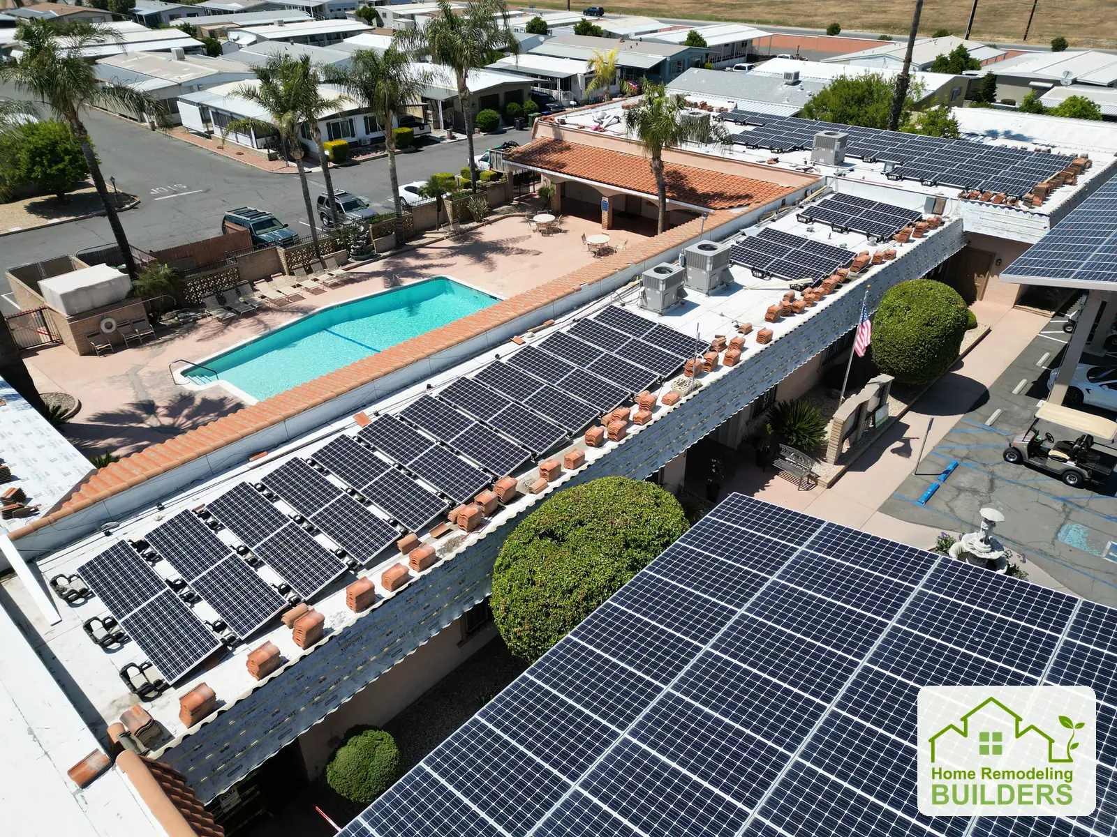 The long roof section beside the pool, viewed from above. Hemet roofing project.