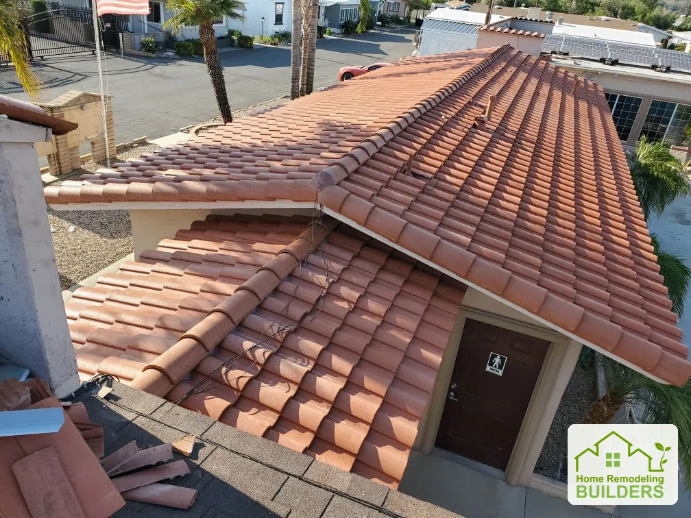 Existing tiles at the intersecting roof slopes. Hemet roofing project.