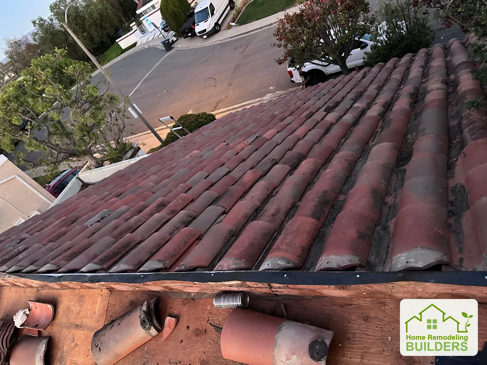 A closer view of tile removal at the roof edge. Laguna Hills roofing project.