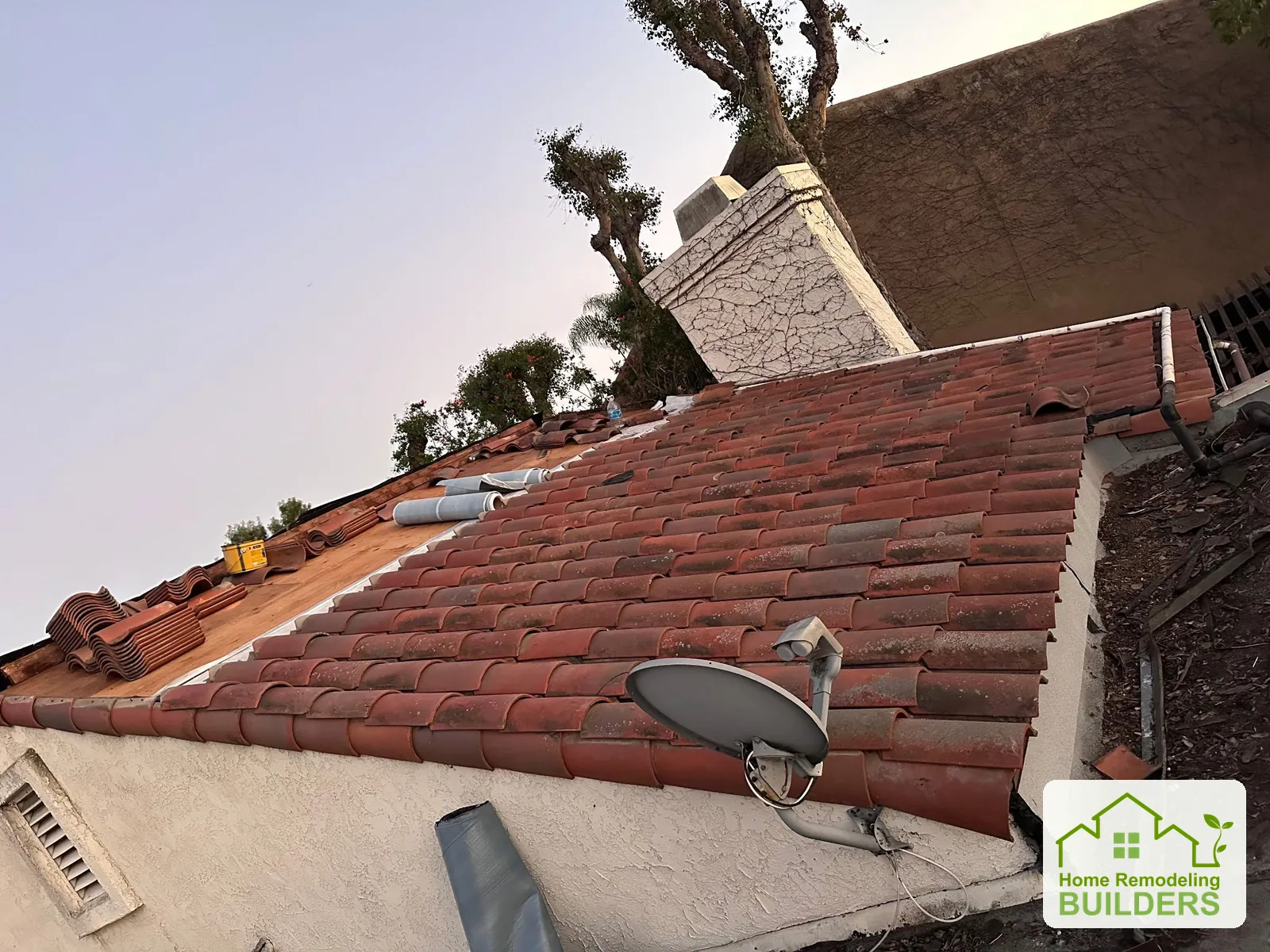 The existing tile roof before the tiles are lifted. Laguna Hills roofing project.
