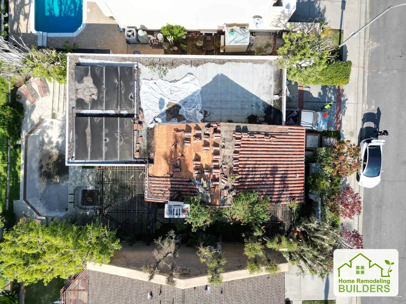An overhead view of tile removal and the exposed roof deck. Laguna Hills roofing project.