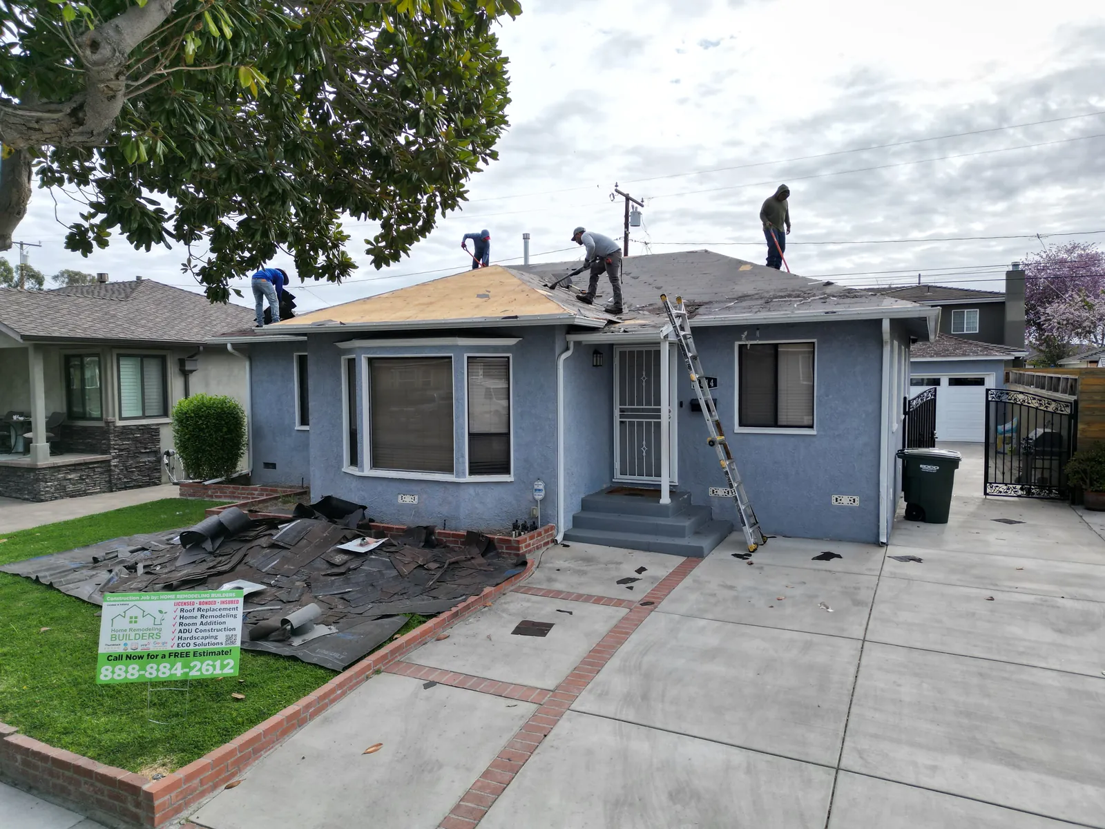 Roof removal and deck work above the front elevation. Lakewood roofing project.