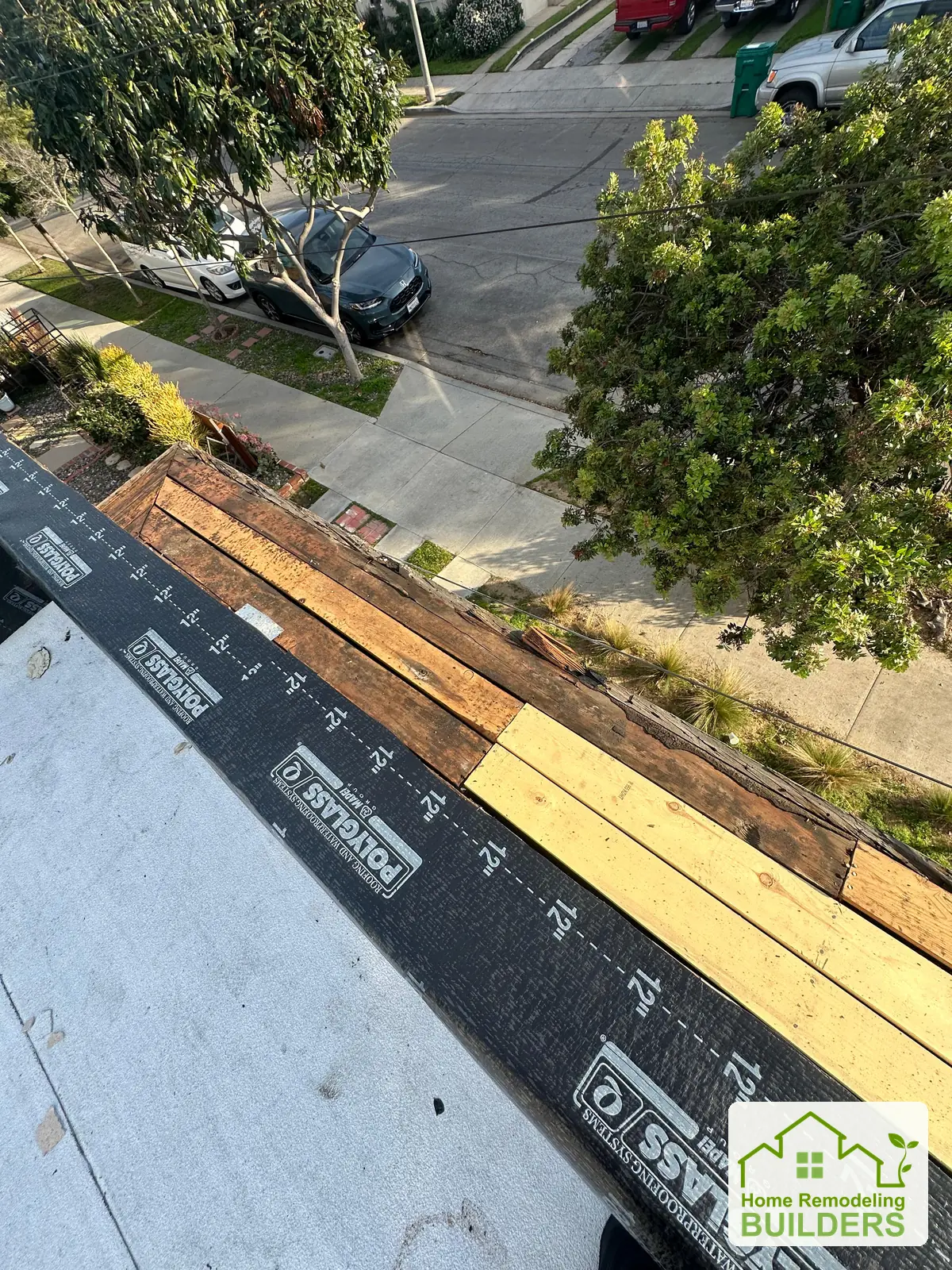 A closer look at the perimeter during installation. Long Beach roofing project.
