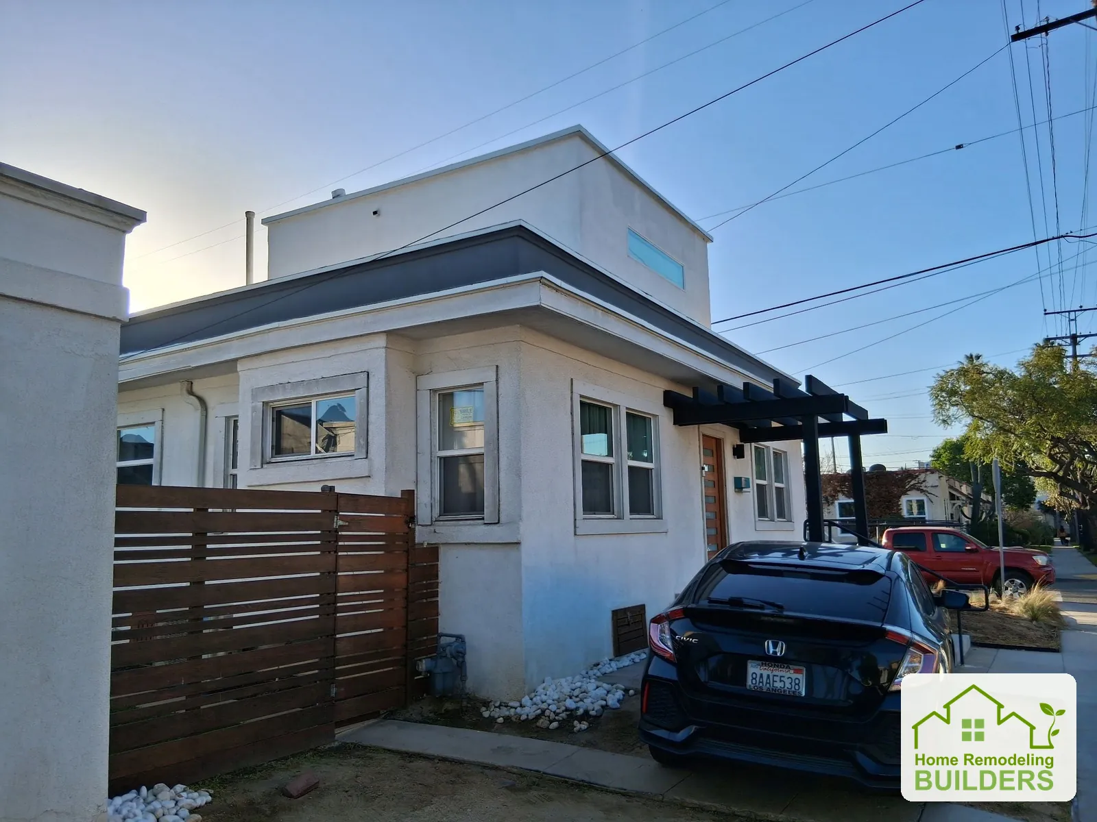 The finished roof edge above the side elevation. Long Beach roofing project.