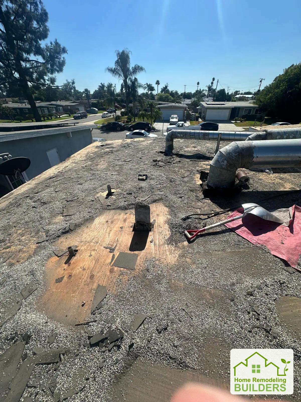 Original roofing around the rooftop equipment. Pico Rivera roofing project.