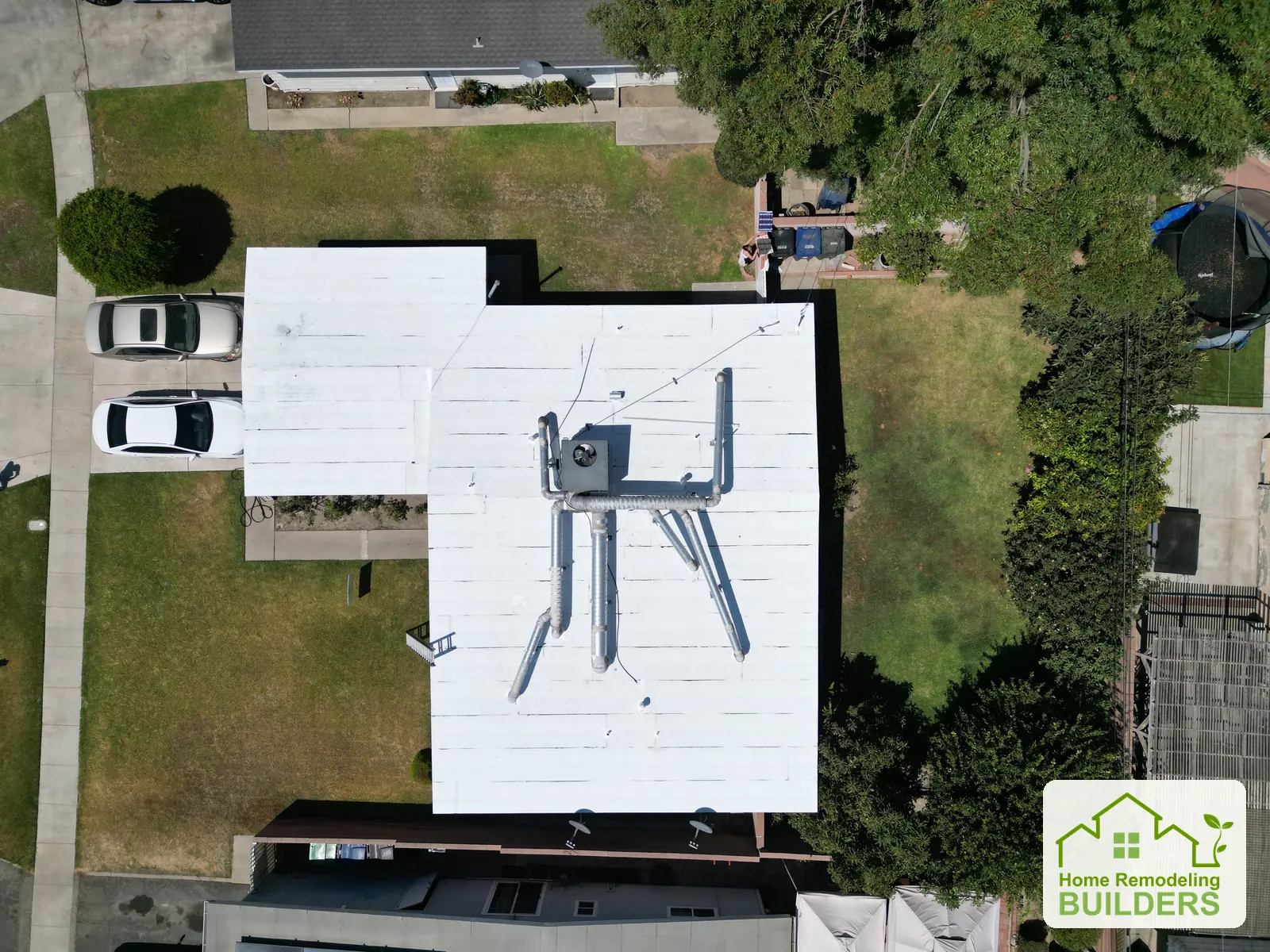 An overhead view of the completed flat roof. Pico Rivera roofing project.