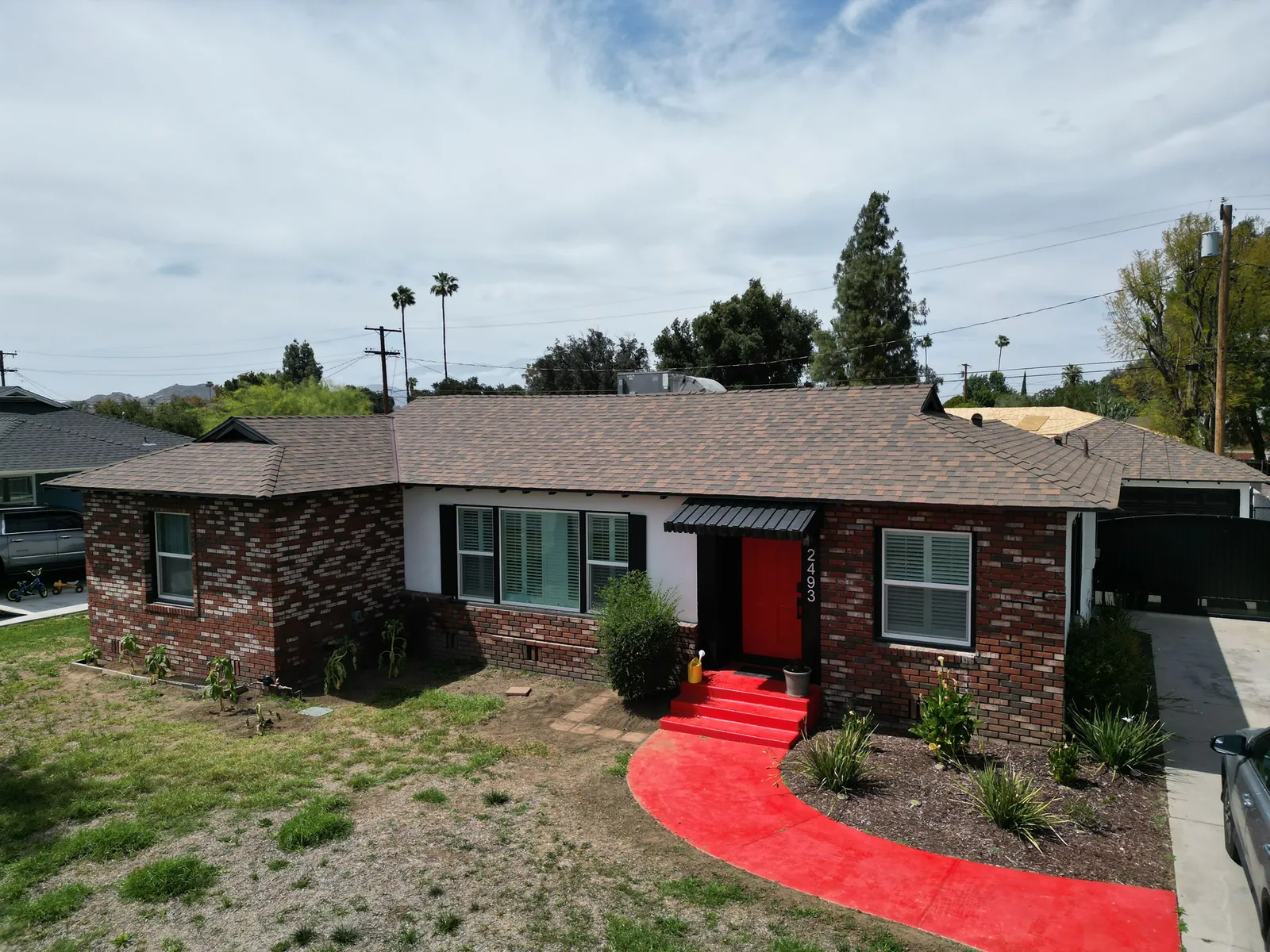The completed roof above the Riverside home. Riverside roofing project.