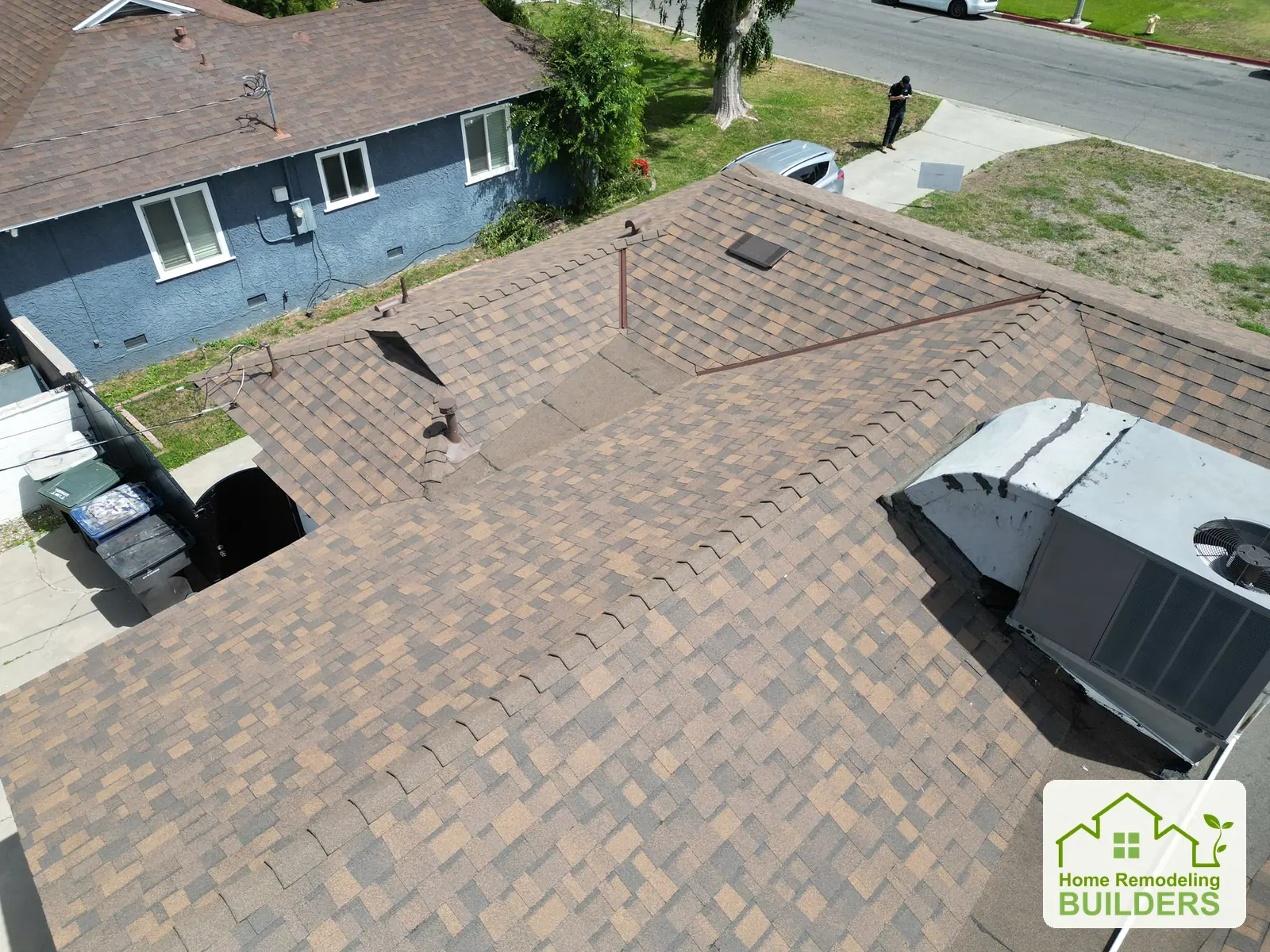 The finished shingle courses viewed from the roof. Riverside roofing project.