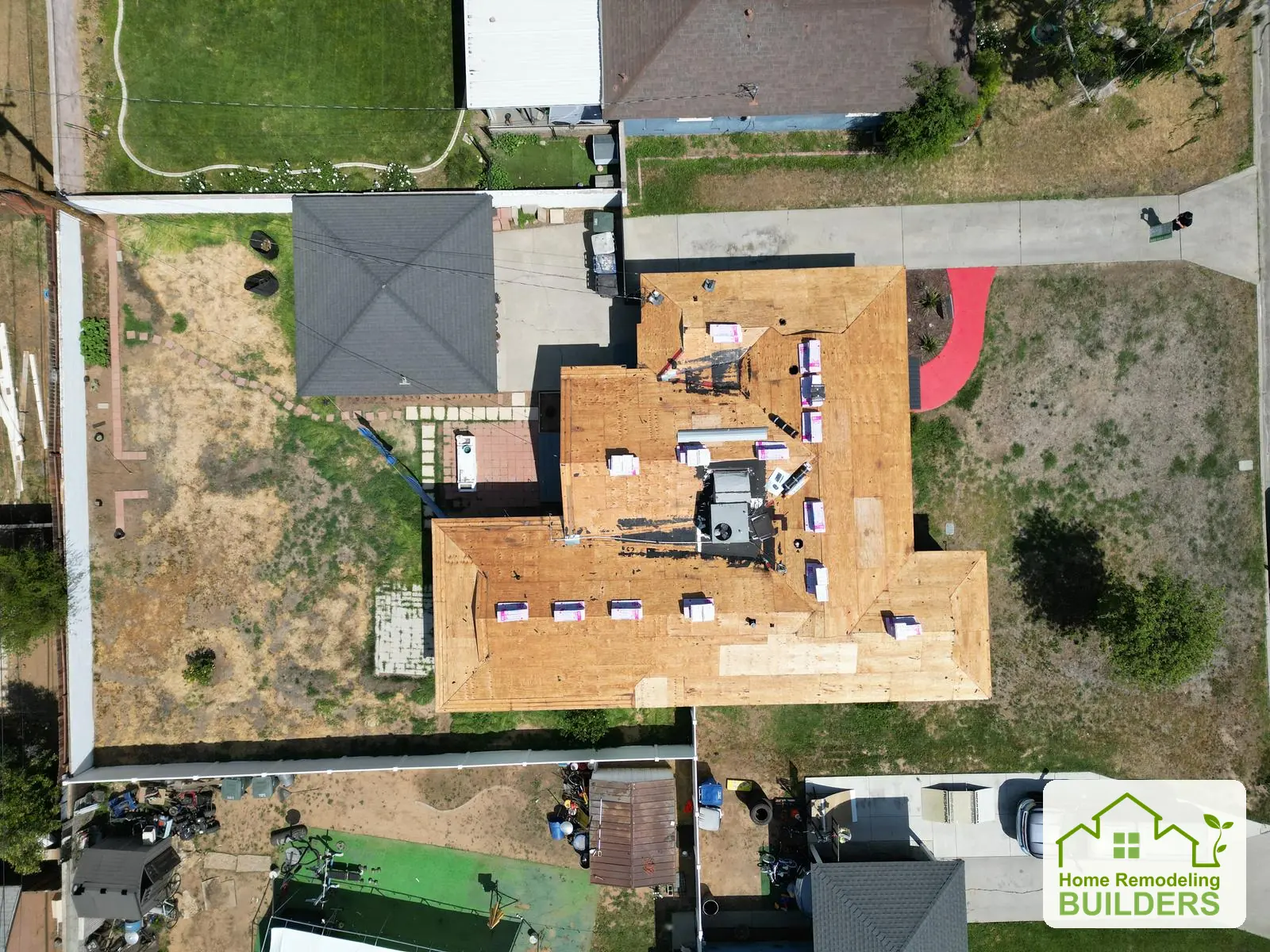 Roof preparation in a straight-down aerial view. Riverside roofing project.