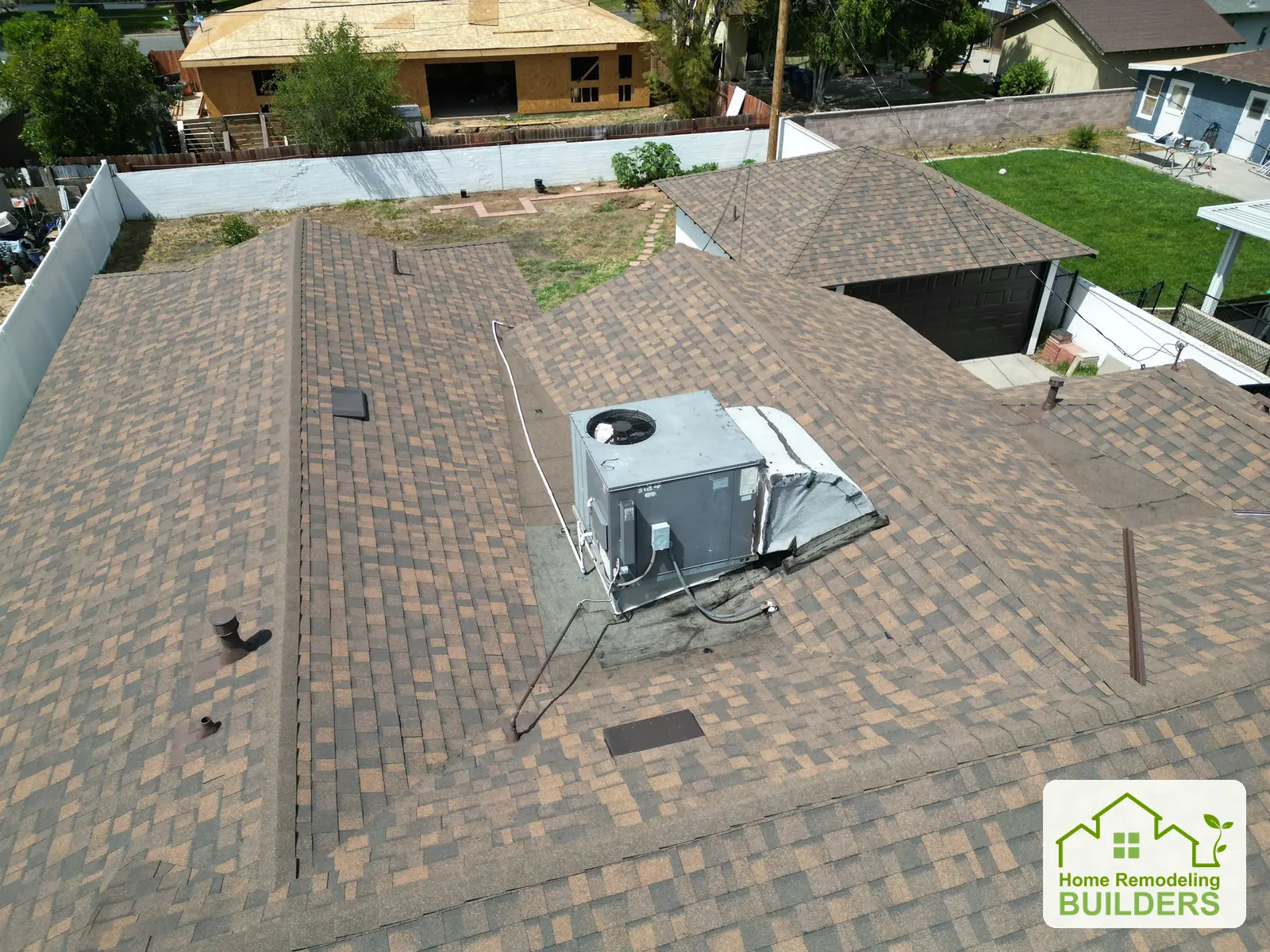 The finished rear roof slope and its transitions. Riverside roofing project.