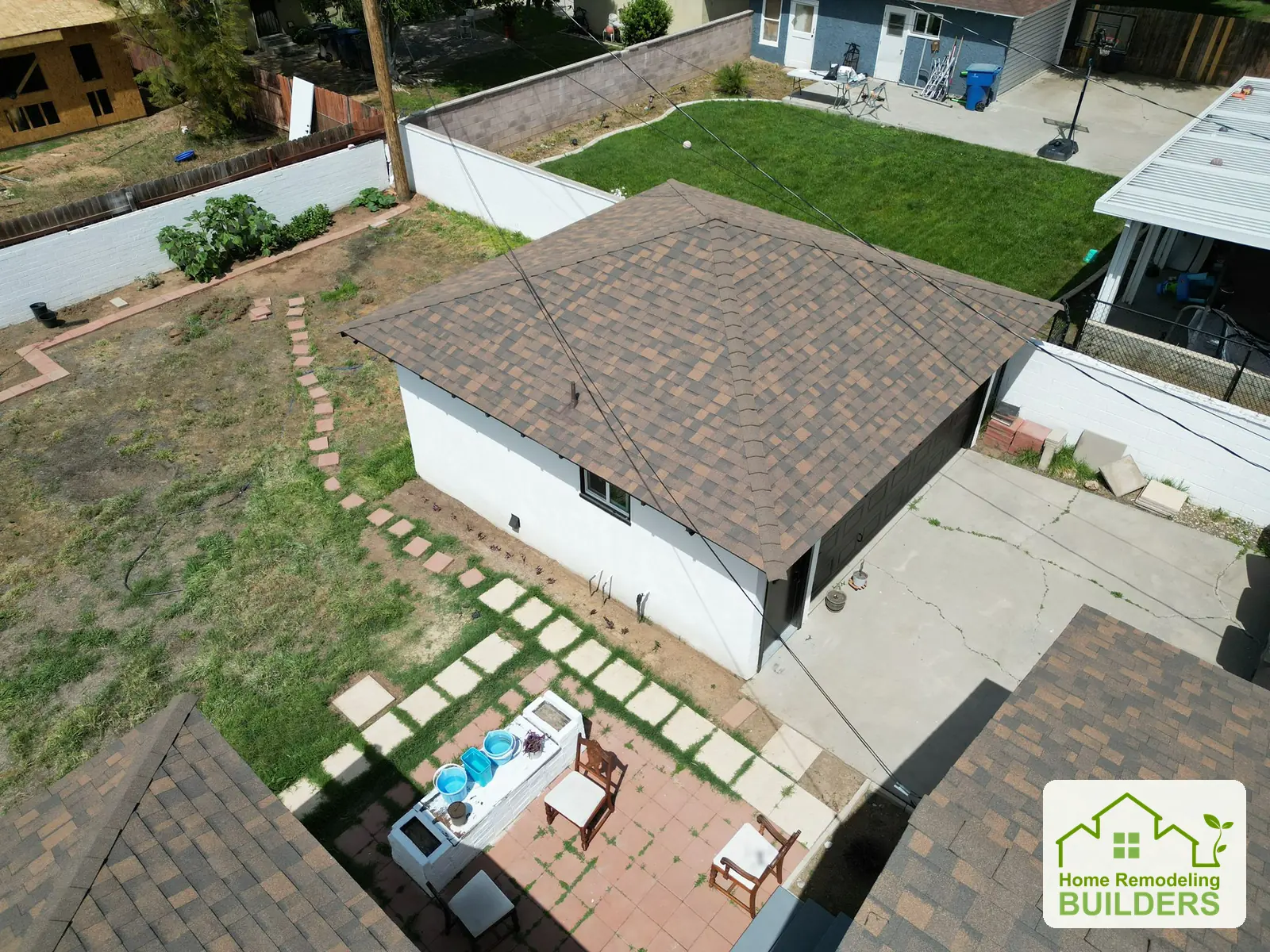 The completed roof viewed from above the backyard. Riverside roofing project.