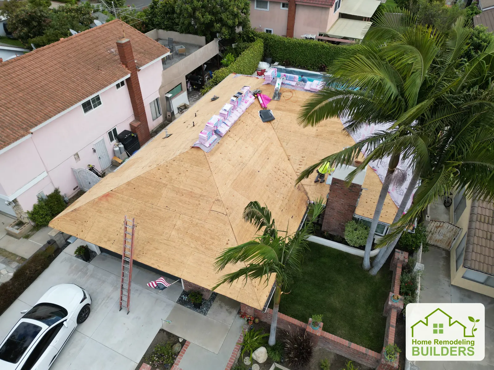 New sheathing across the roof, viewed from above. Santa Ana roofing project.