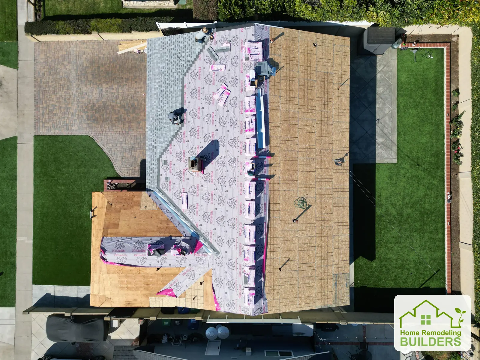 An overhead view of sheathing and underlayment installation. Westminster roofing project.