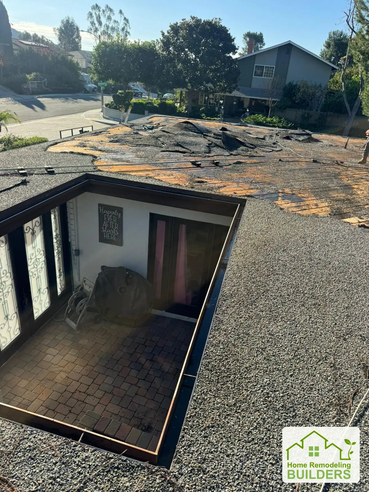 The original flat roof around the skylight. Whittier Â· Flat roof roofing project.