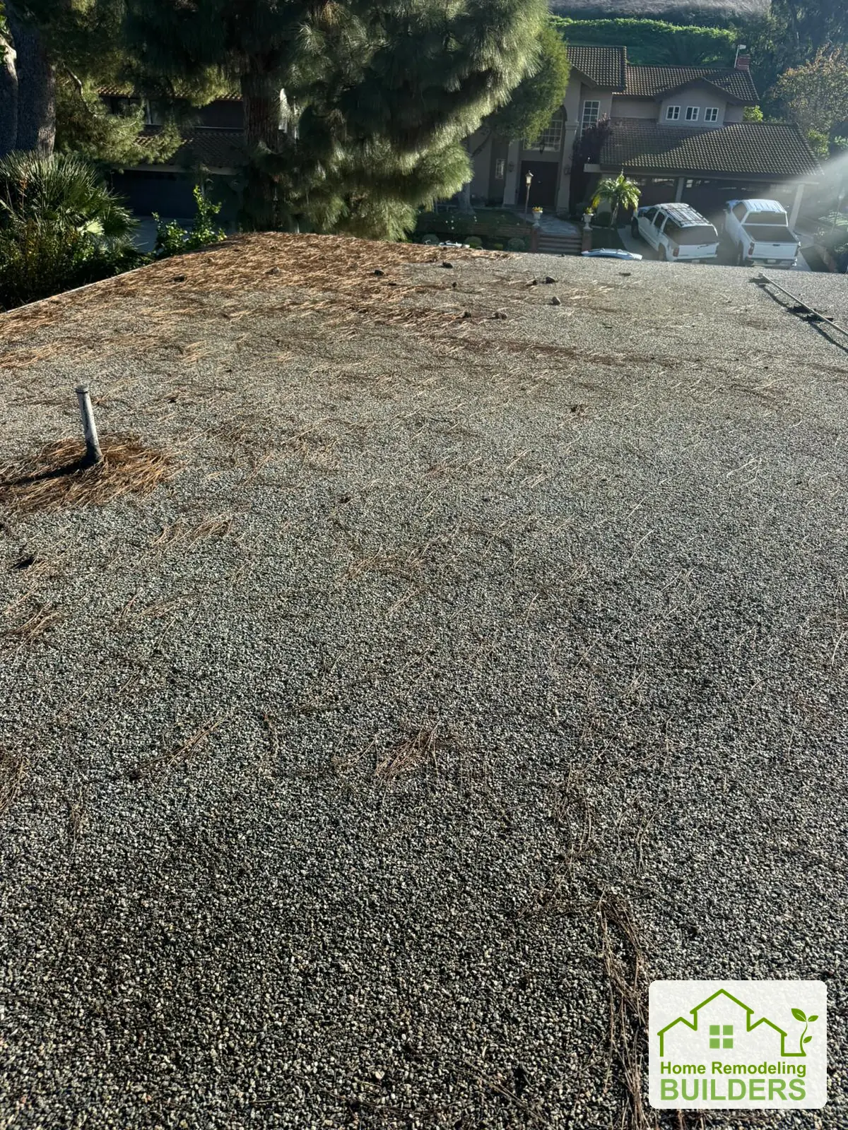 A closer view of the weathered roof surface. Whittier Â· Flat roof roofing project.